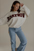 Sweat SIXTINE gris chiné à inscription bordeaux, silhouette de face